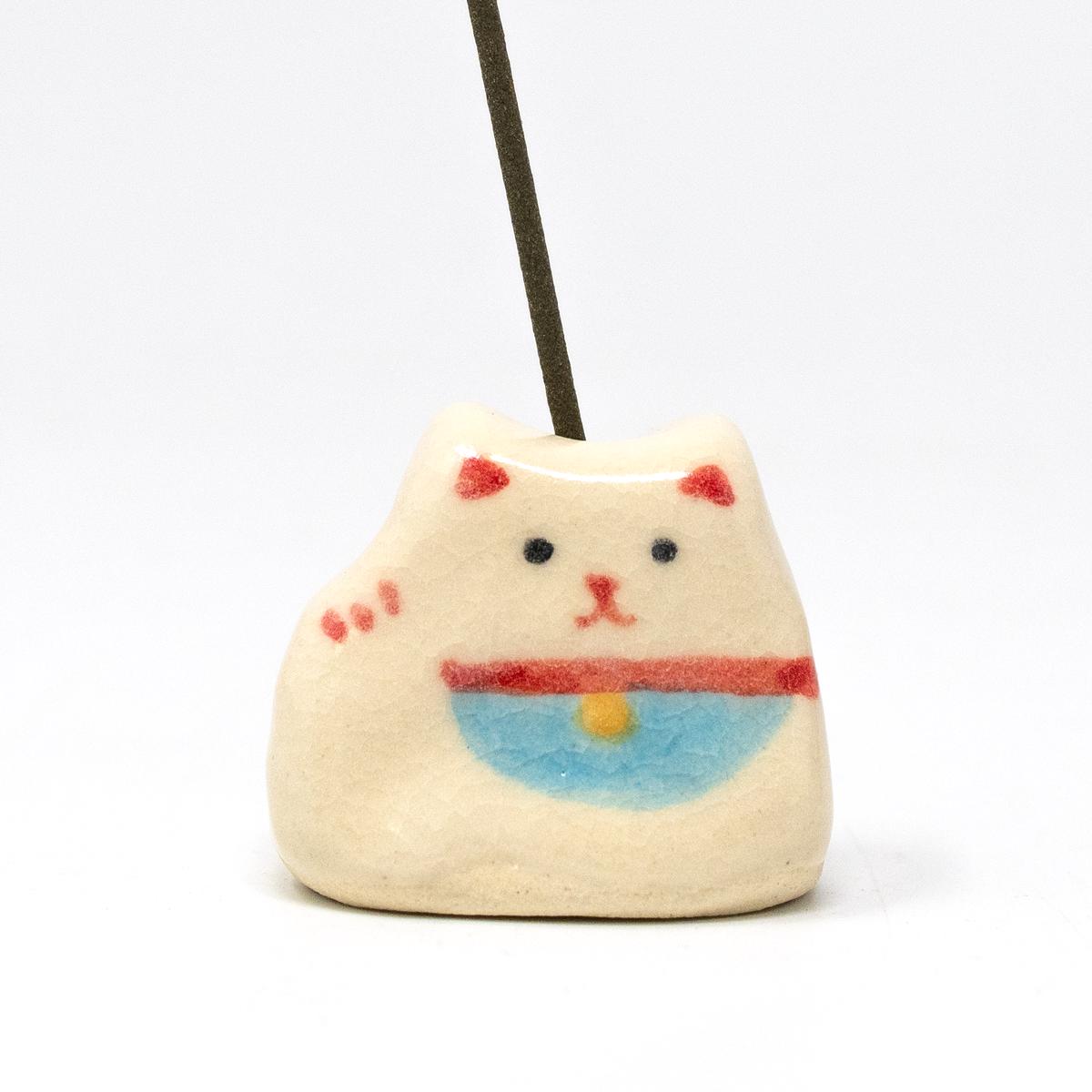 white cat incense holder with stick