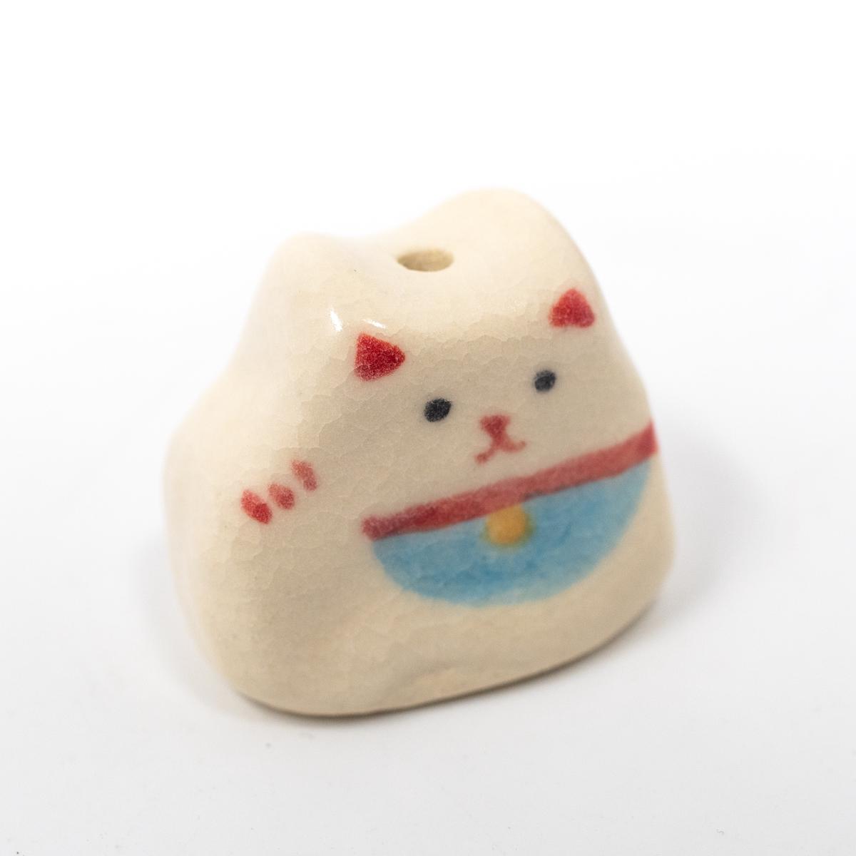 white cat incense holder angle