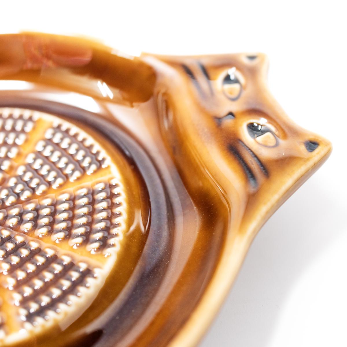 brown cat grater closeup