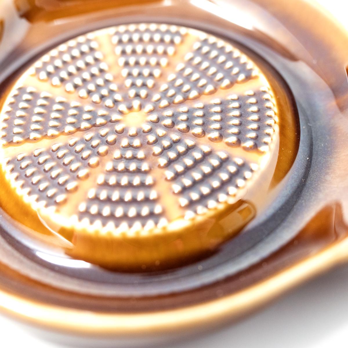 brown cat grater closeup top