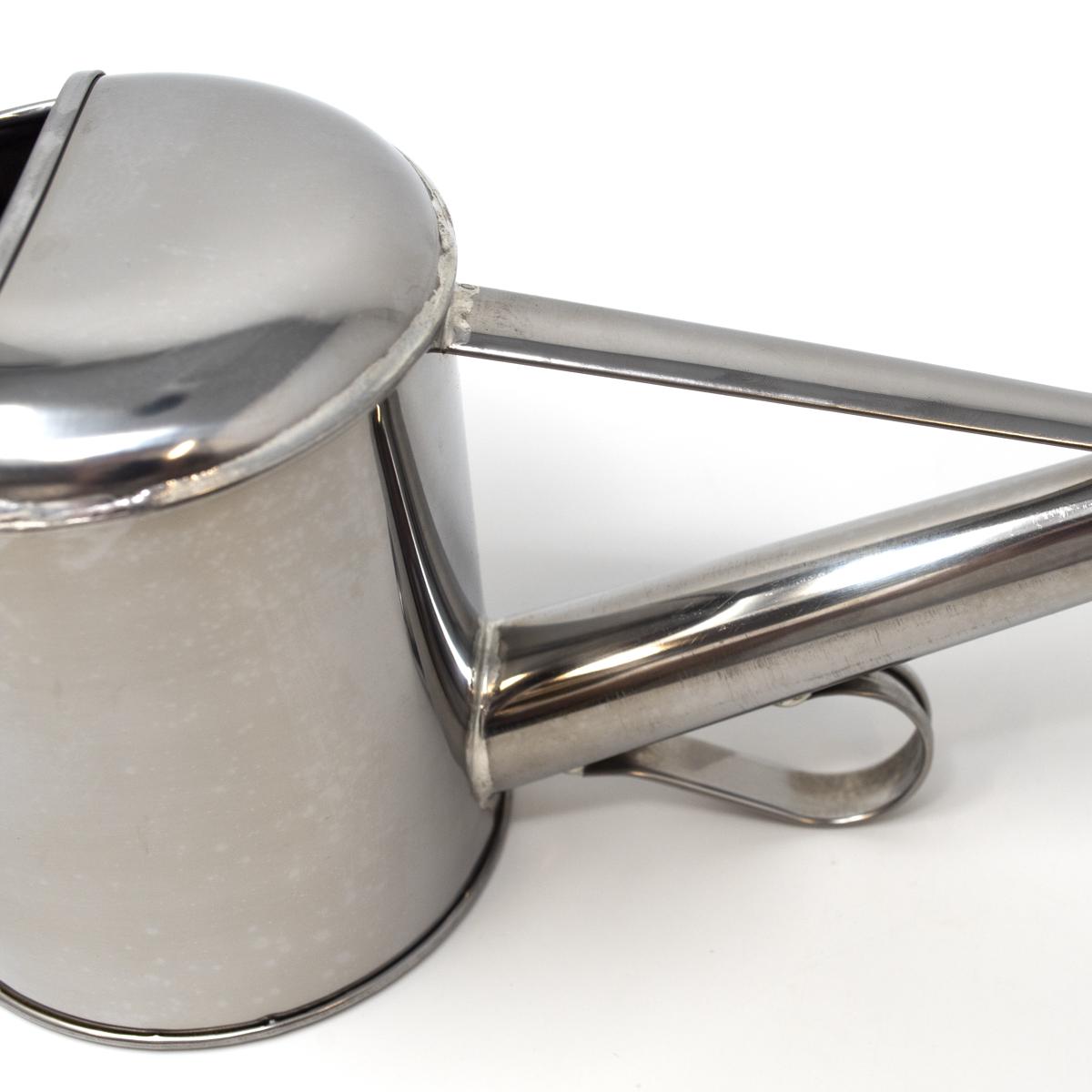 silver watering can spout and can