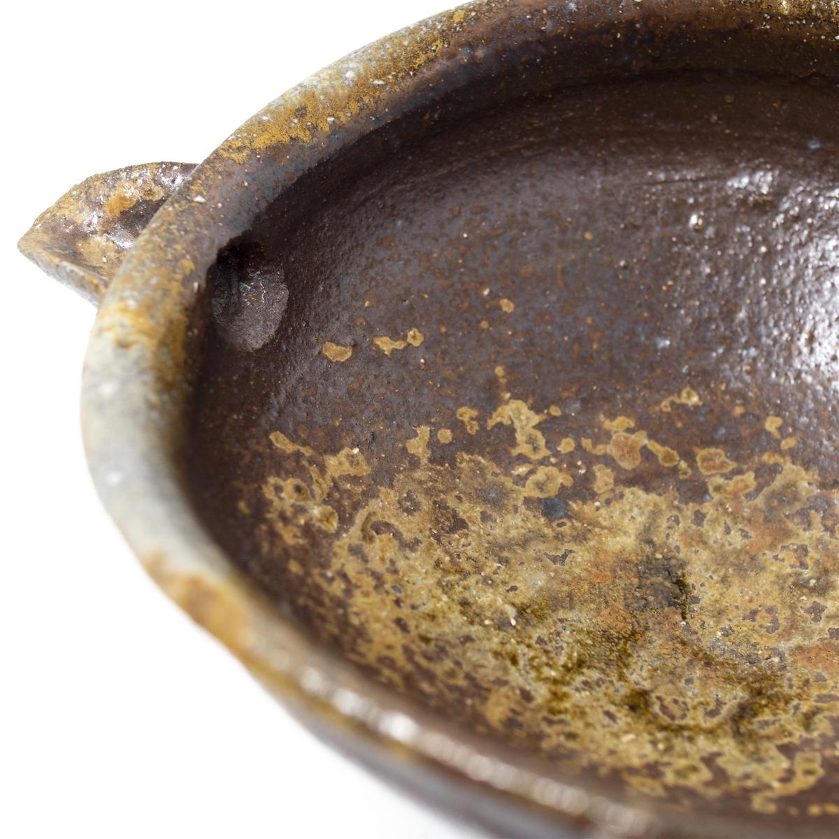 isao dark brown pitcher top closeup