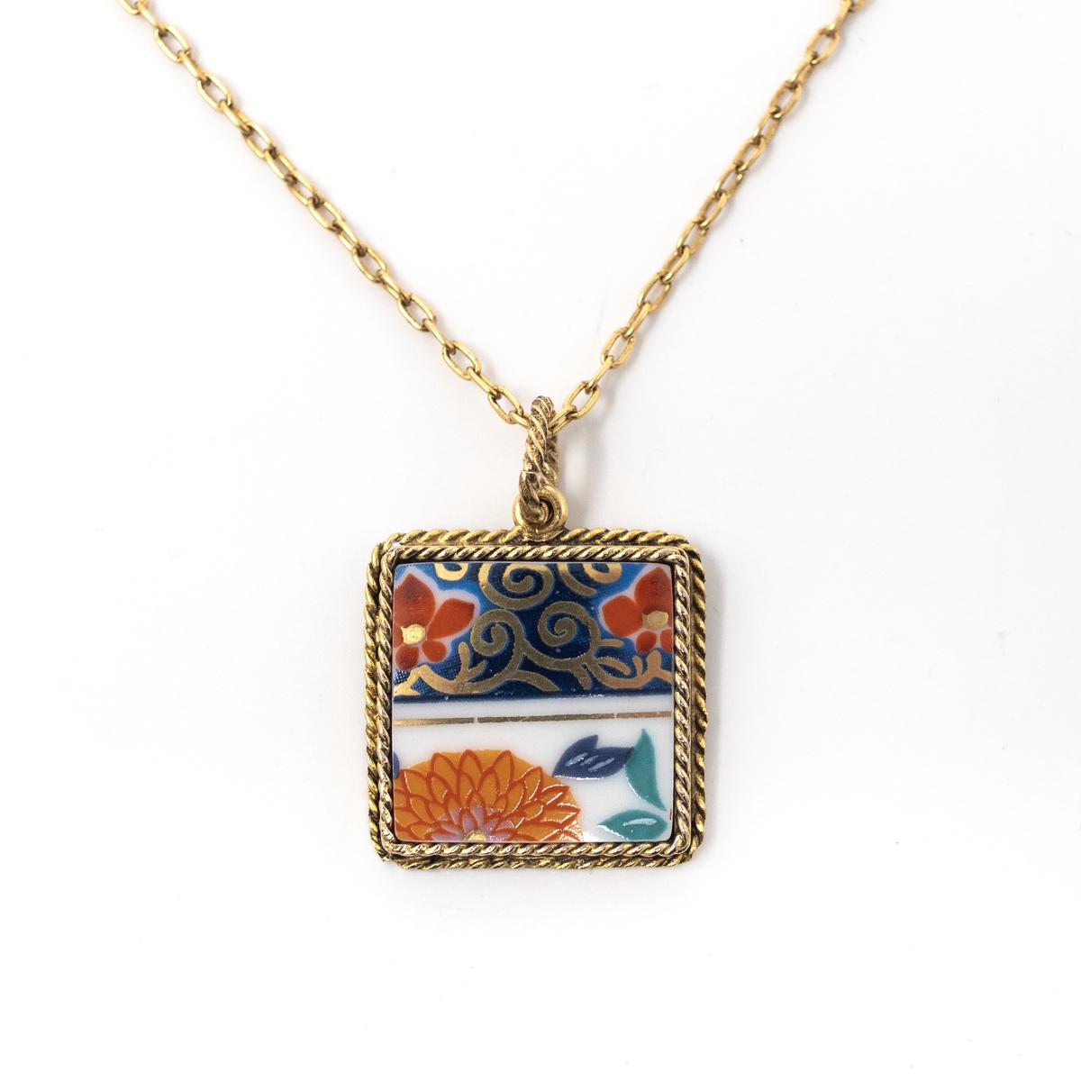 nozomi gold necklace orange blue red