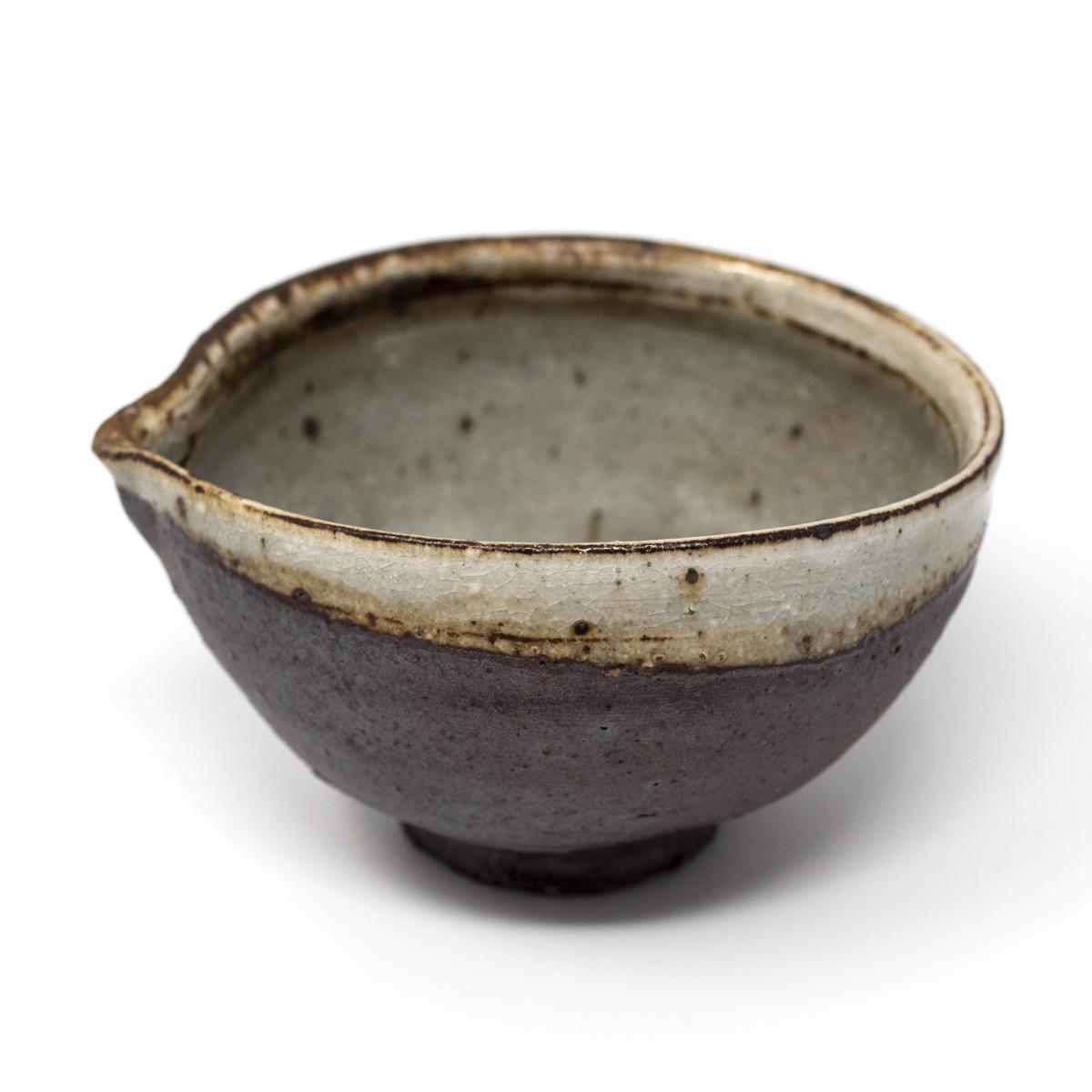 isao brown white pitcher top angle