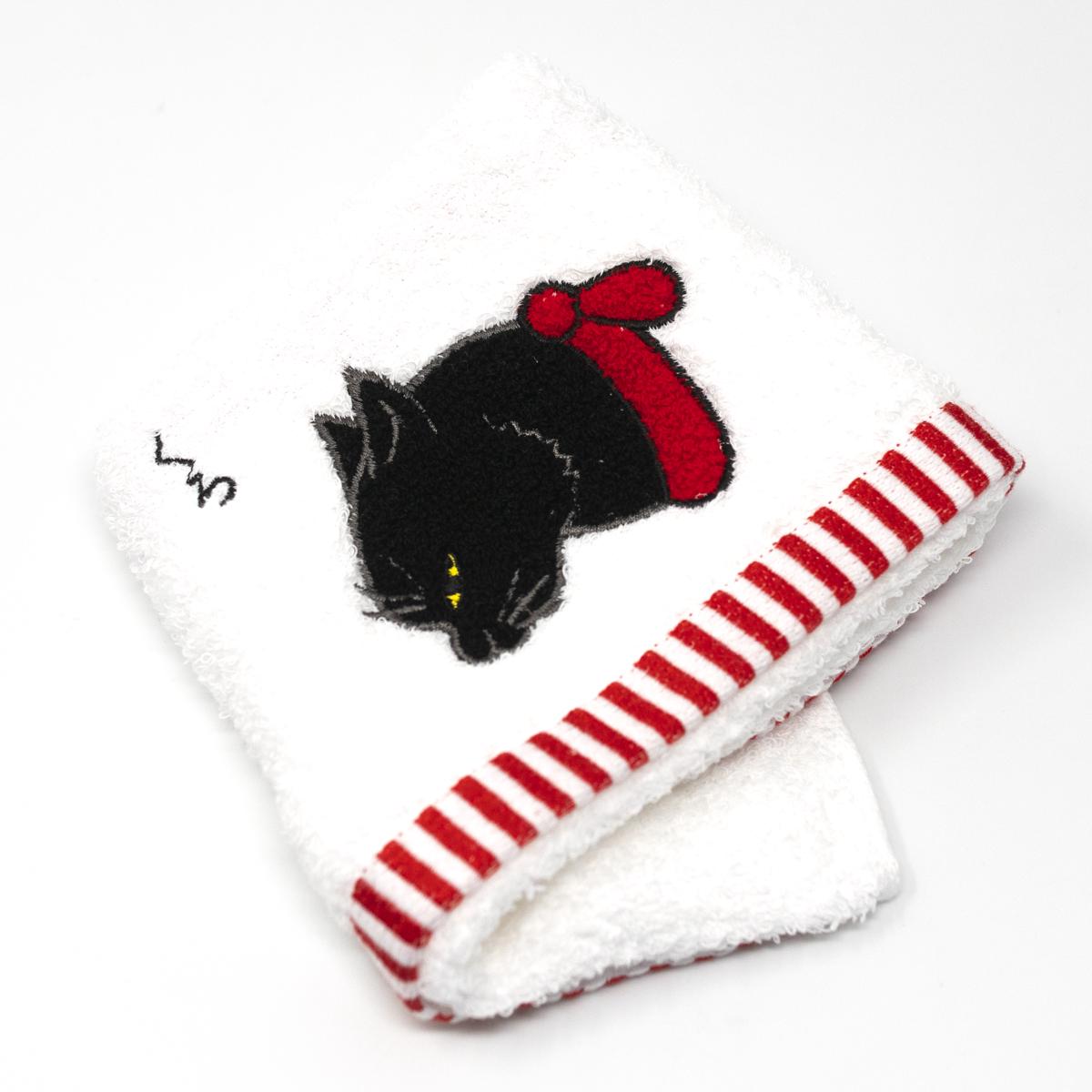 black cat towel top closeup