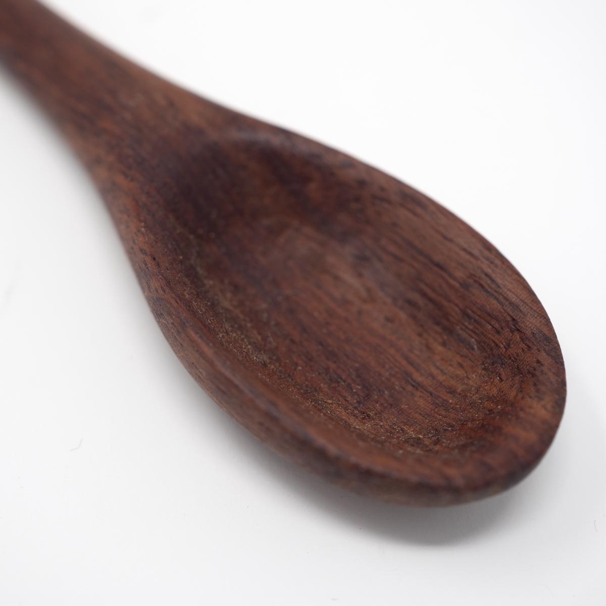 qasa qasa wooden spoon head closeup