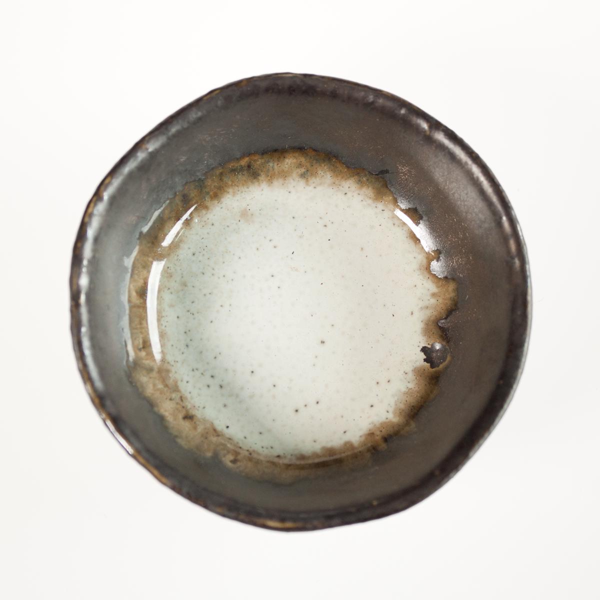 brown and white pinchpot top