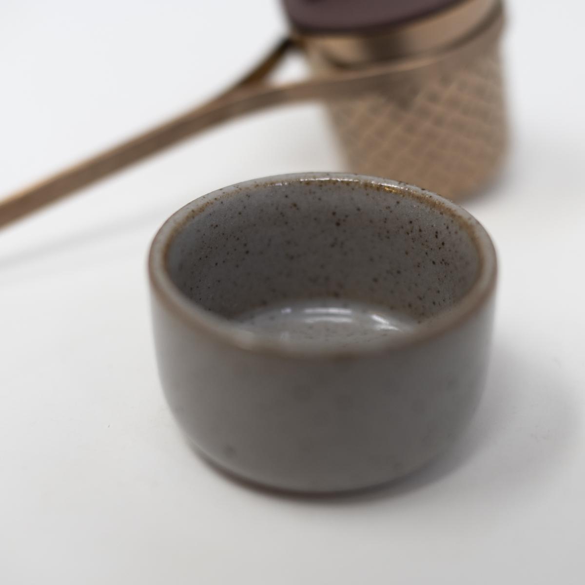 notable tea strainer pot closeup