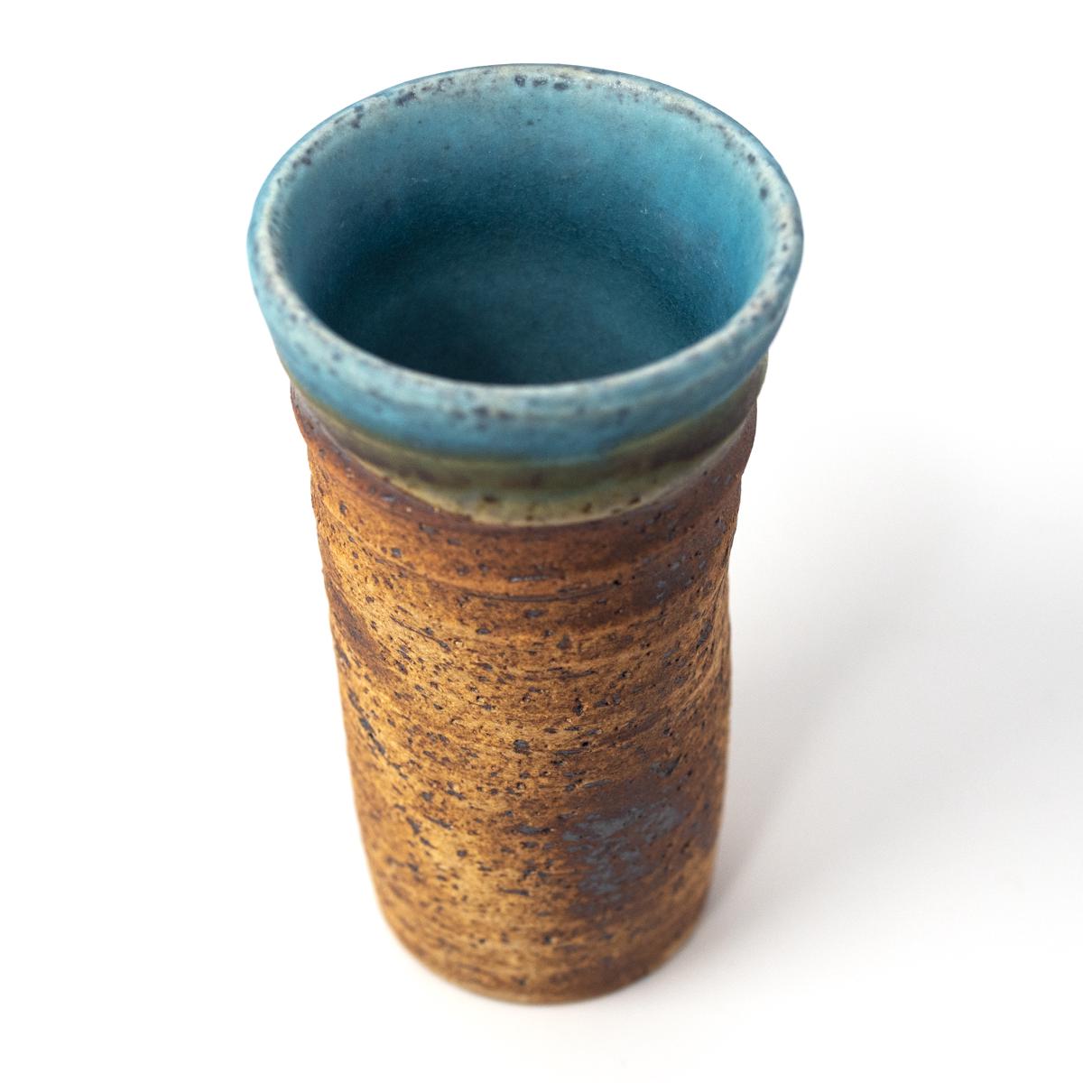 general ceramics tall blue brown cup top angle