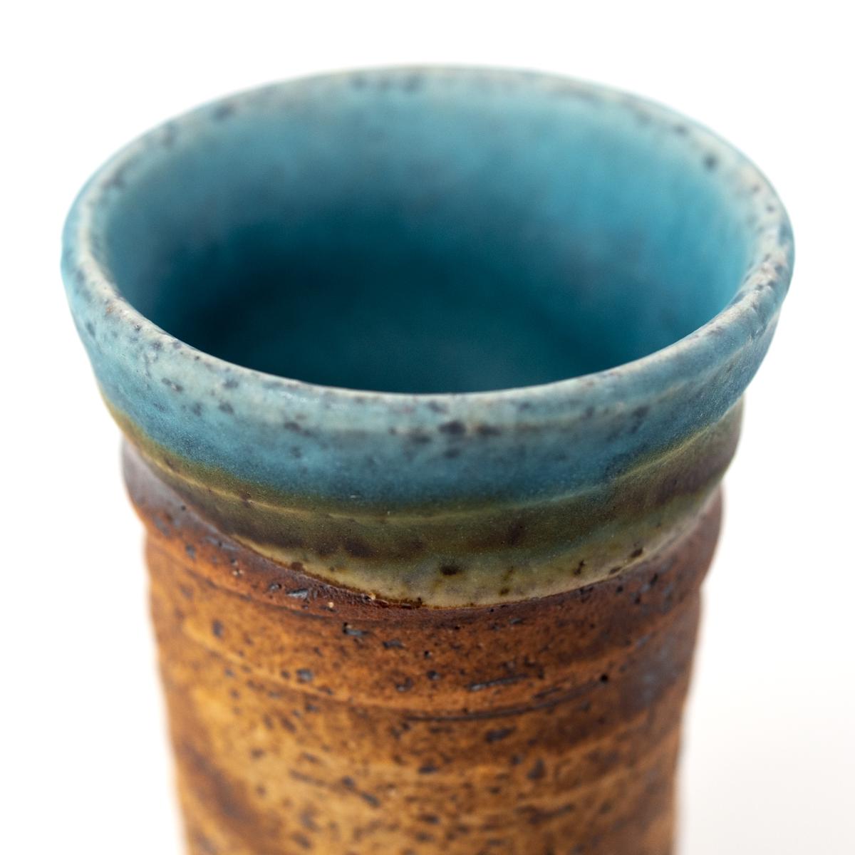 general ceramics tall blue brown cup closeup