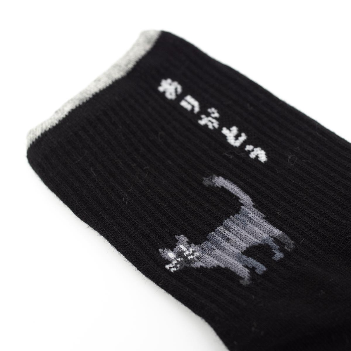 general black cat socks closeup