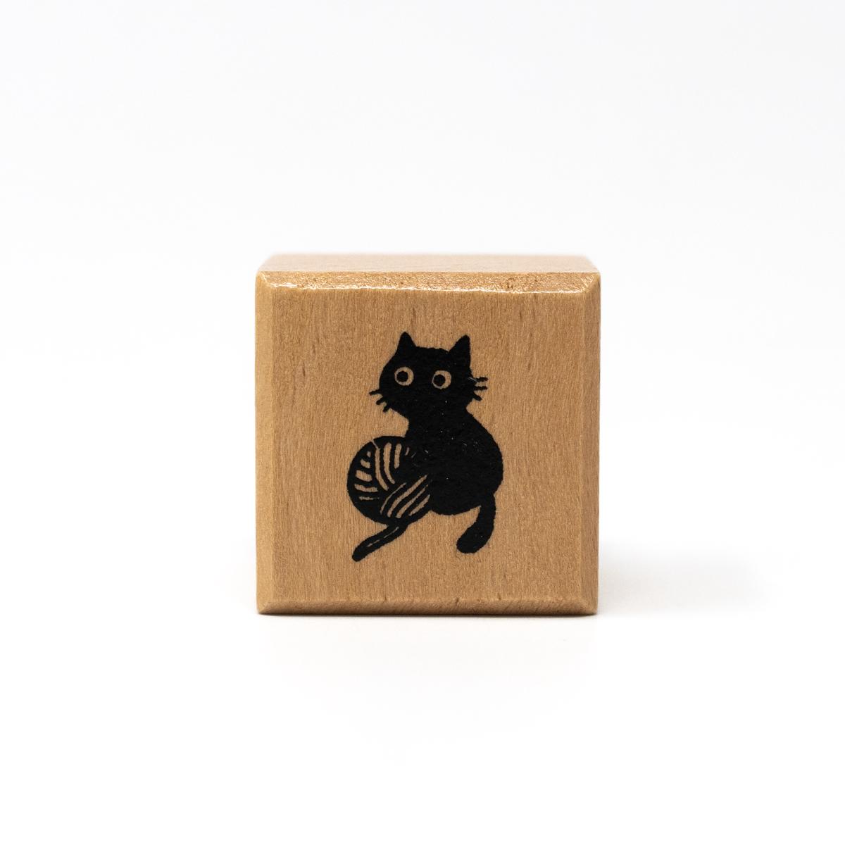 ali cat stamp ball of string