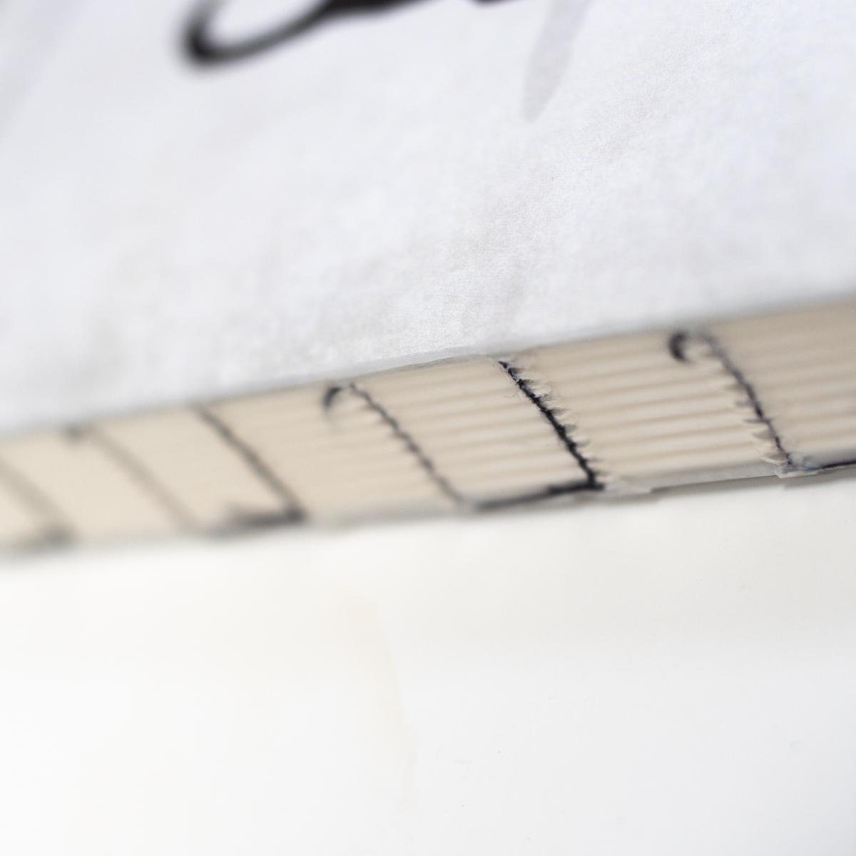 Slow Design black cat notebook spine