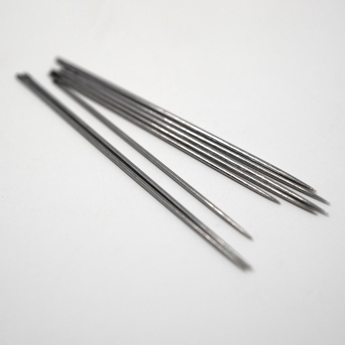 needles close