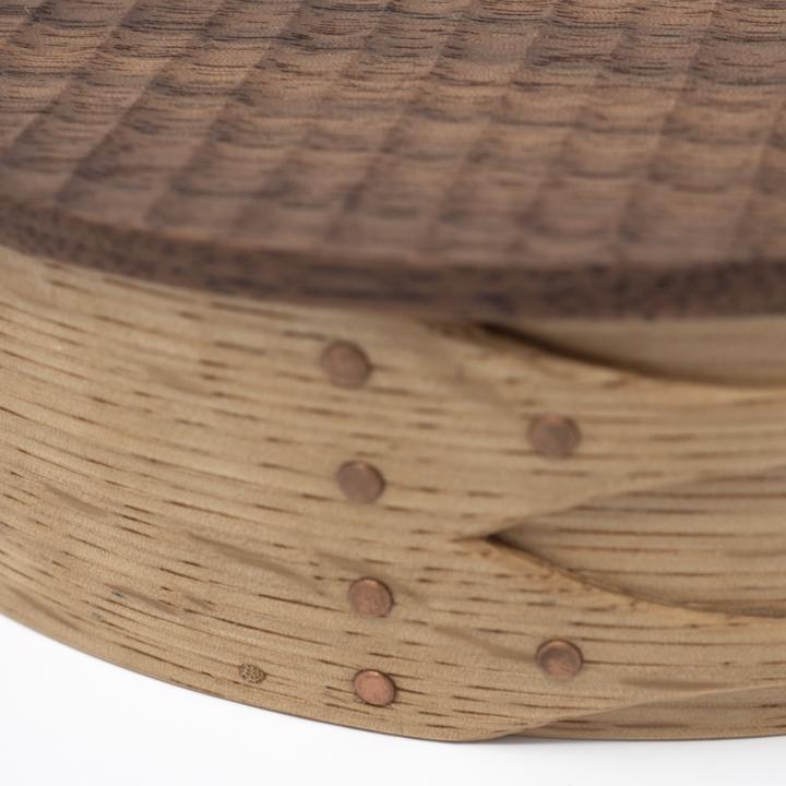 plain wooden oval box closeup