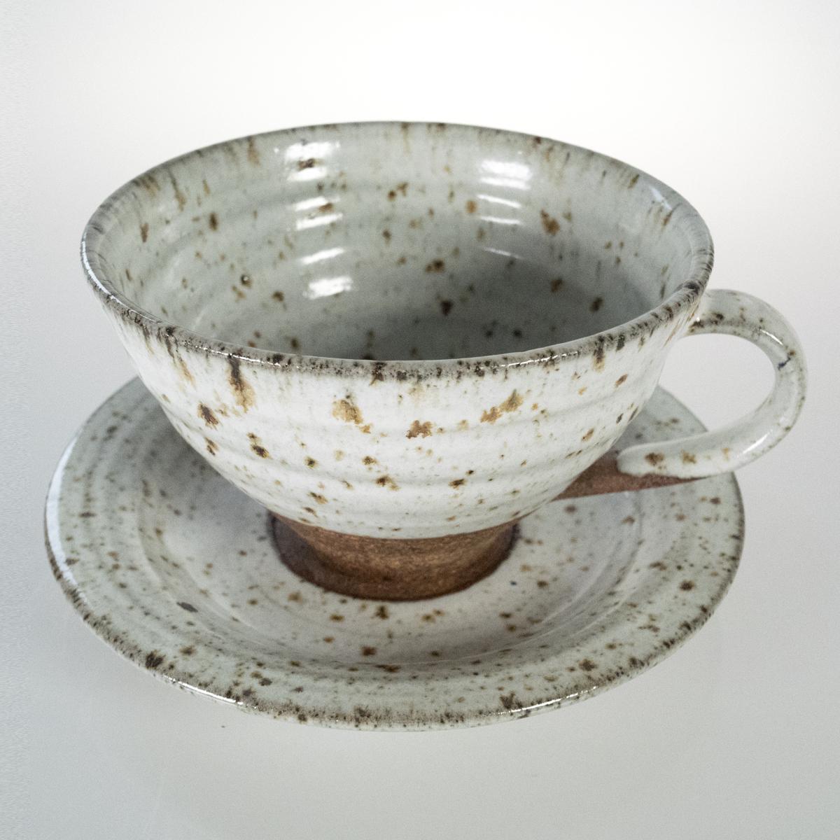 specked cup and saucer side angle