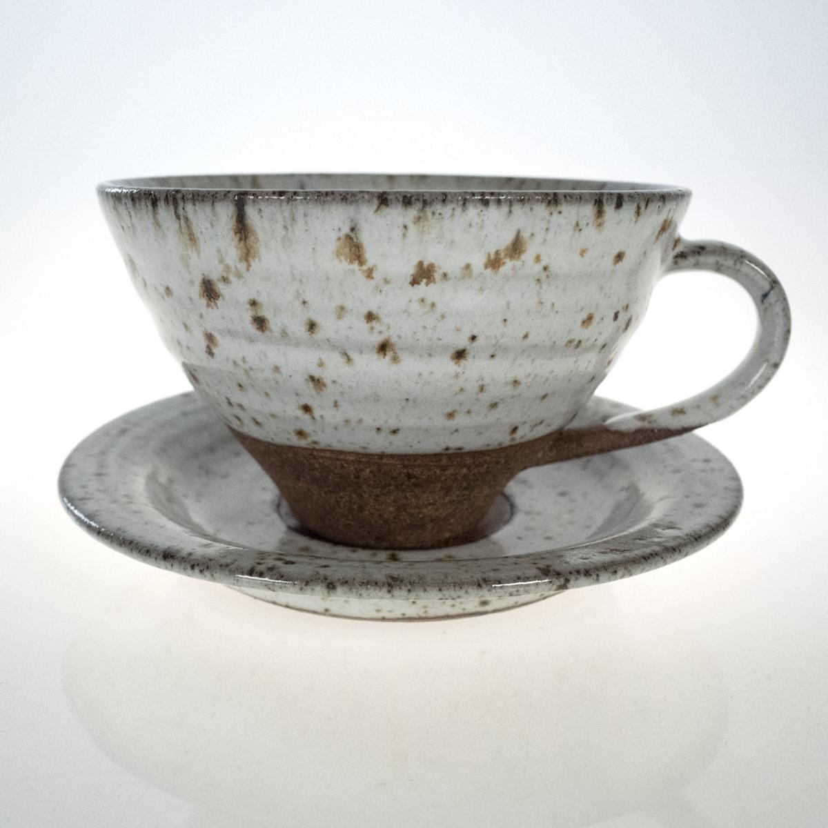 specked cup and saucer side