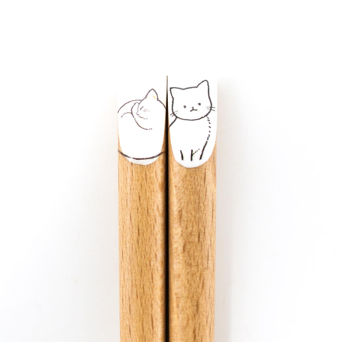 general cat chopsticks white closeup