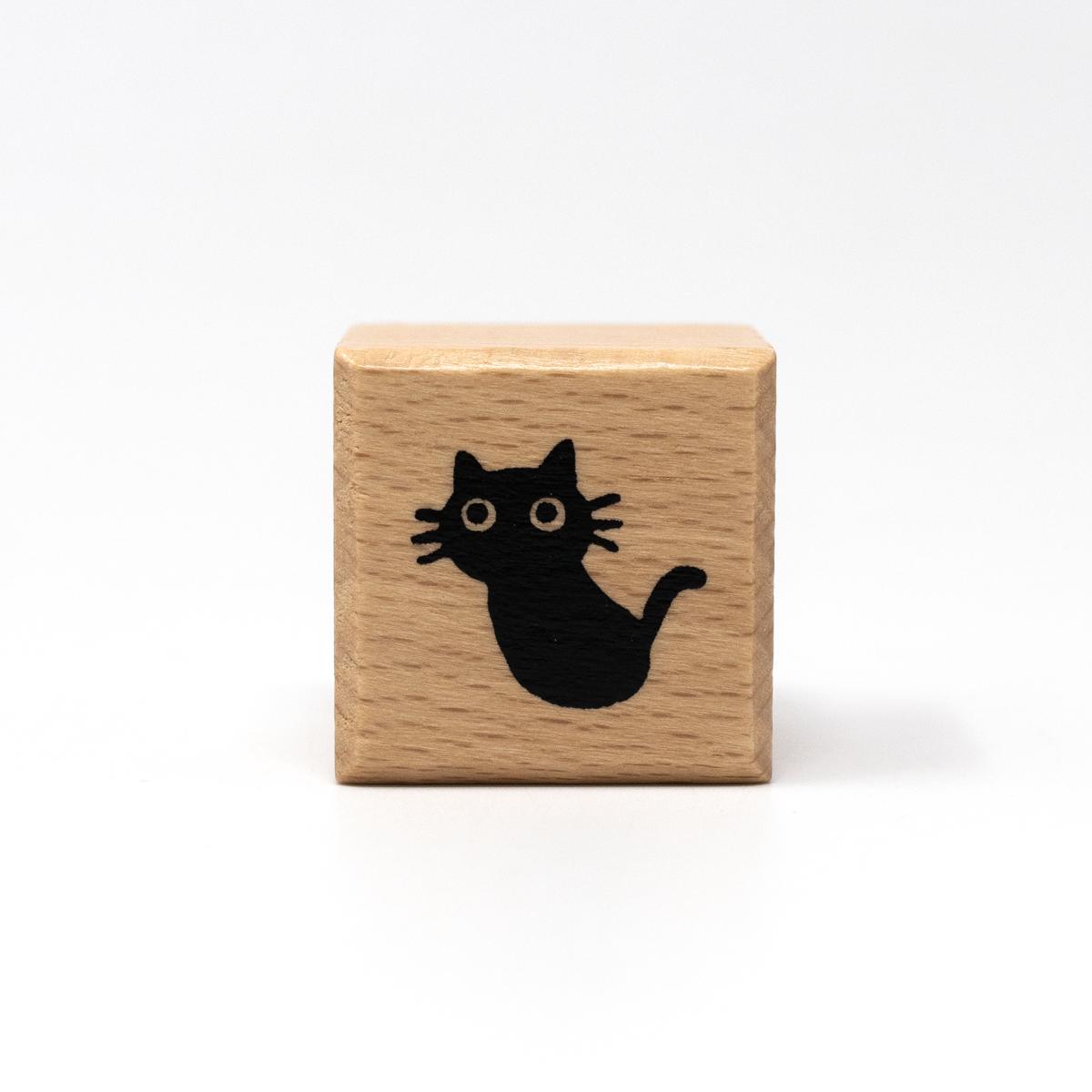 ali cat stamp sitting