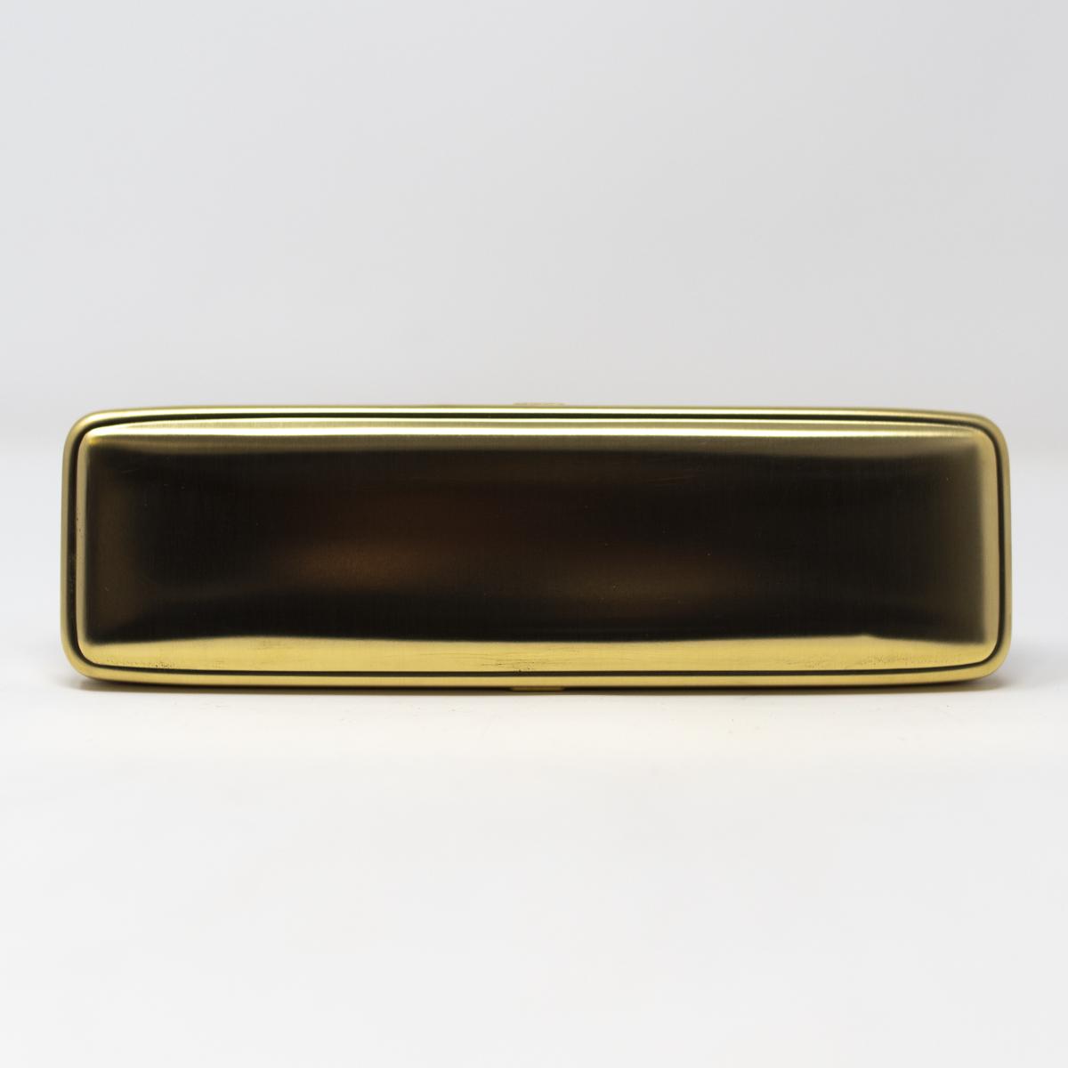 notable brass pencil case top