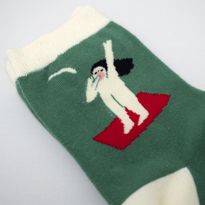 green woman socks angle close